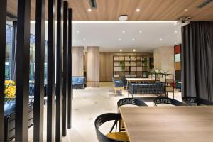 Home Inn Paibaiyun Hotel Chengdu Tianyu Road Subway Station Branch的休息区