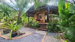 Zahrada ubytování Tee Bungalow in the jungle