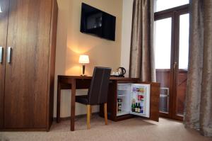 TV o dispositivi per l'intrattenimento presso Hotel U Kvapilů