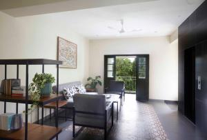 Posezení v ubytování Radha House Siolim A Boutique Hotel
