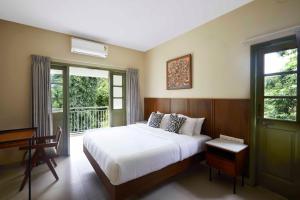 Postel nebo postele na pokoji v ubytování Radha House Siolim A Boutique Hotel + 35 fotografií