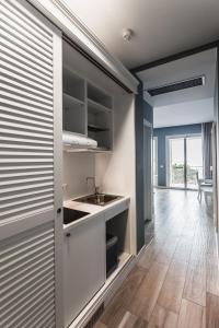 Kuchyň nebo kuchyňský kout v ubytování Hotel Nettuno