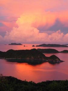 an island in the middle of a large body of water at Cha Villa in Zamami