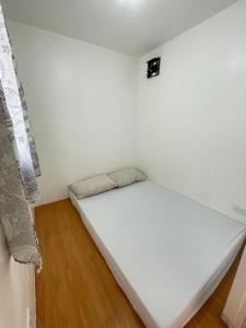 Postel nebo postele na pokoji v ubytování tadzmahal