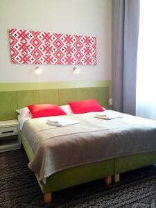 Łóżko lub łóżka w pokoju w obiekcie Hotel *** NAT Krynica Zdrój