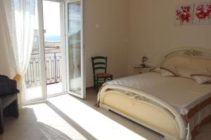 Postelja oz. postelje v sobi nastanitve Holiday Rentals Taormina