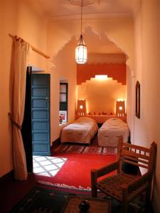 Katil atau katil-katil dalam bilik di Riad El Filali