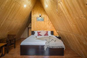 Postel nebo postele na pokoji v ubytování A-Frame Retreat By Bastiat Stays