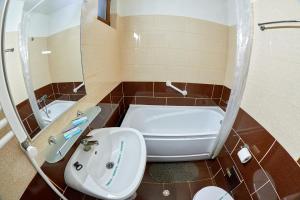 Koupelna v ubytování Hotel Coralis