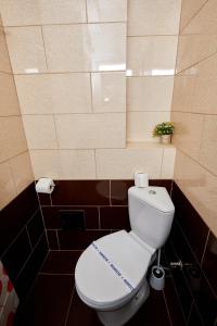 Koupelna v ubytování Hotel Coralis