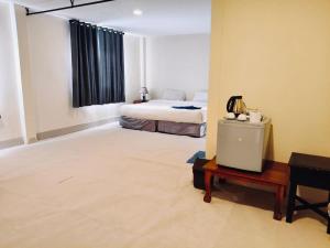 Voodi või voodid majutusasutuse Lonely beach complex titanic hotel in beach shopping street markets ในศูนการค้าติดทะเล toas