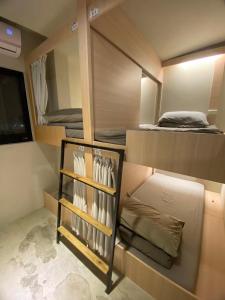 Postel nebo postele na pokoji v ubytování 藍貝島潛水背包旅宿二館 Lambay Island Dive Hostel II