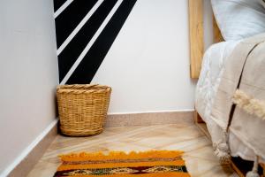 Letto o letti in una camera di Tigmi Ossmon Hostel