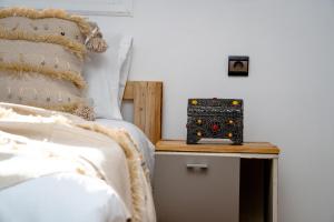 Letto o letti in una camera di Tigmi Ossmon Hostel