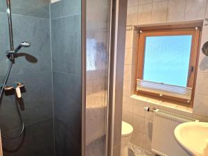 Ein Badezimmer in der Unterkunft Chalet Scheffsnoth