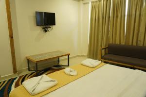Deva's Retreat客房内的一张或多张床位