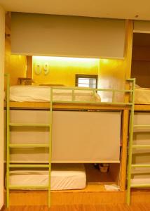 Postel nebo postele na pokoji v ubytování Leaf Sustainable Hostel