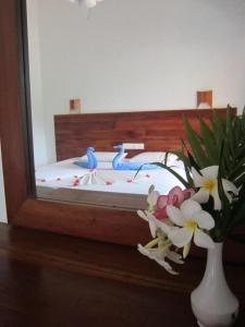 Voodi või voodid majutusasutuse Janus Paradise Rest toas