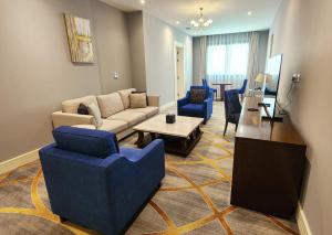 Svetainės erdvė apgyvendinimo įstaigoje Sherao Hotel Doha فندق شراعوه الدوحة
