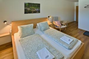 Postel nebo postele na pokoji v ubytování Pension Korýtko