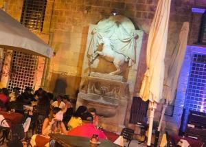 a large statue of a man riding a horse in a building at Luciano Valletta Boutique in Valletta