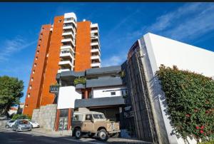 a truck parked in front of a building at Atlantic Views Luxury Retreat in Estoril
