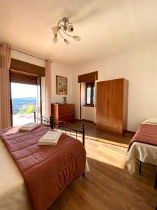 Postel nebo postele na pokoji v ubytování Hotel Risorgimento
