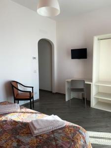 TV a/nebo společenská místnost v ubytování Hotel Risorgimento
