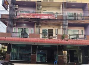 a building with a train on top of it at Rest Stay Hatyai in Ban Khlong Toei (1)