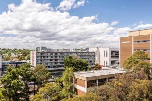 a view of a city with buildings and trees at VAQUAY Alkina In Hawthorn in Melbourne