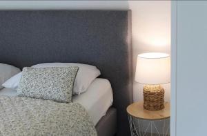 Ένα ή περισσότερα κρεβάτια σε δωμάτιο στο Apartman Buba