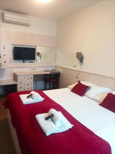 Postel nebo postele na pokoji v ubytování Hotel Olberg