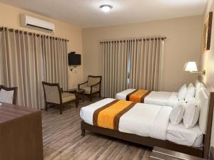 Voodi või voodid majutusasutuse Hotel Shuman, Boudha toas