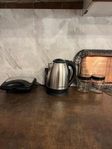 Comodidades para chá e café em Adi's apartmant