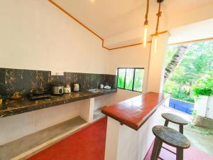 Cucina o angolo cottura di Coco Mount Mirissa