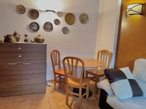 Posedenie v ubytovaní Apartamento con vistas Taull