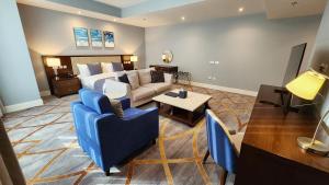 Svetainės erdvė apgyvendinimo įstaigoje Sherao Hotel Doha فندق شراعوه الدوحة