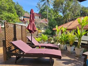 Ein Garten an der Unterkunft DB Studios Samui - Adults Only