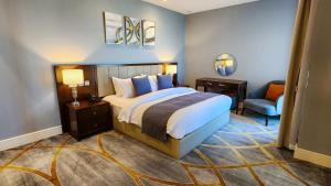 Lova arba lovos apgyvendinimo įstaigoje Sherao Hotel Doha فندق شراعوه الدوحة