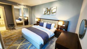 Lova arba lovos apgyvendinimo įstaigoje Sherao Hotel Doha فندق شراعوه الدوحة