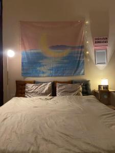 Postel nebo postele na pokoji v ubytování Cozy Fam Homestay Hanoi