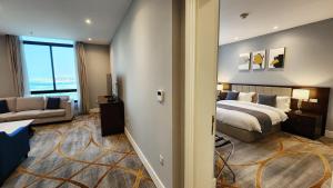 Lova arba lovos apgyvendinimo įstaigoje Sherao Hotel Doha فندق شراعوه الدوحة