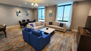 Svetainės erdvė apgyvendinimo įstaigoje Sherao Hotel Doha فندق شراعوه الدوحة