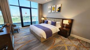Lova arba lovos apgyvendinimo įstaigoje Sherao Hotel Doha فندق شراعوه الدوحة