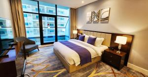 Lova arba lovos apgyvendinimo įstaigoje Sherao Hotel Doha فندق شراعوه الدوحة