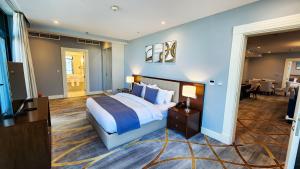 Lova arba lovos apgyvendinimo įstaigoje Sherao Hotel Doha فندق شراعوه الدوحة