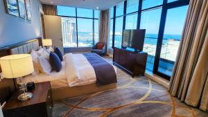 Lova arba lovos apgyvendinimo įstaigoje Sherao Hotel Doha فندق شراعوه الدوحة