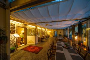 Restaurace v ubytování Gästezimmer La Storia
