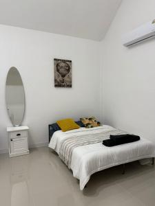 Postel nebo postele na pokoji v ubytování PMEs Home