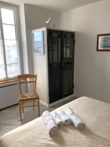 Postel nebo postele na pokoji v ubytování Les Coquillages de Langrune-sur-mer